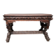 Antique carved oak table in Flemish Gothic style.