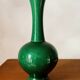 Green ceramic baluster vase