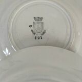 Set of 8 ironstone plates with coordinated designs.