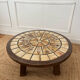 Round coffee table in ceramic and wood in the style of Roger Capron.