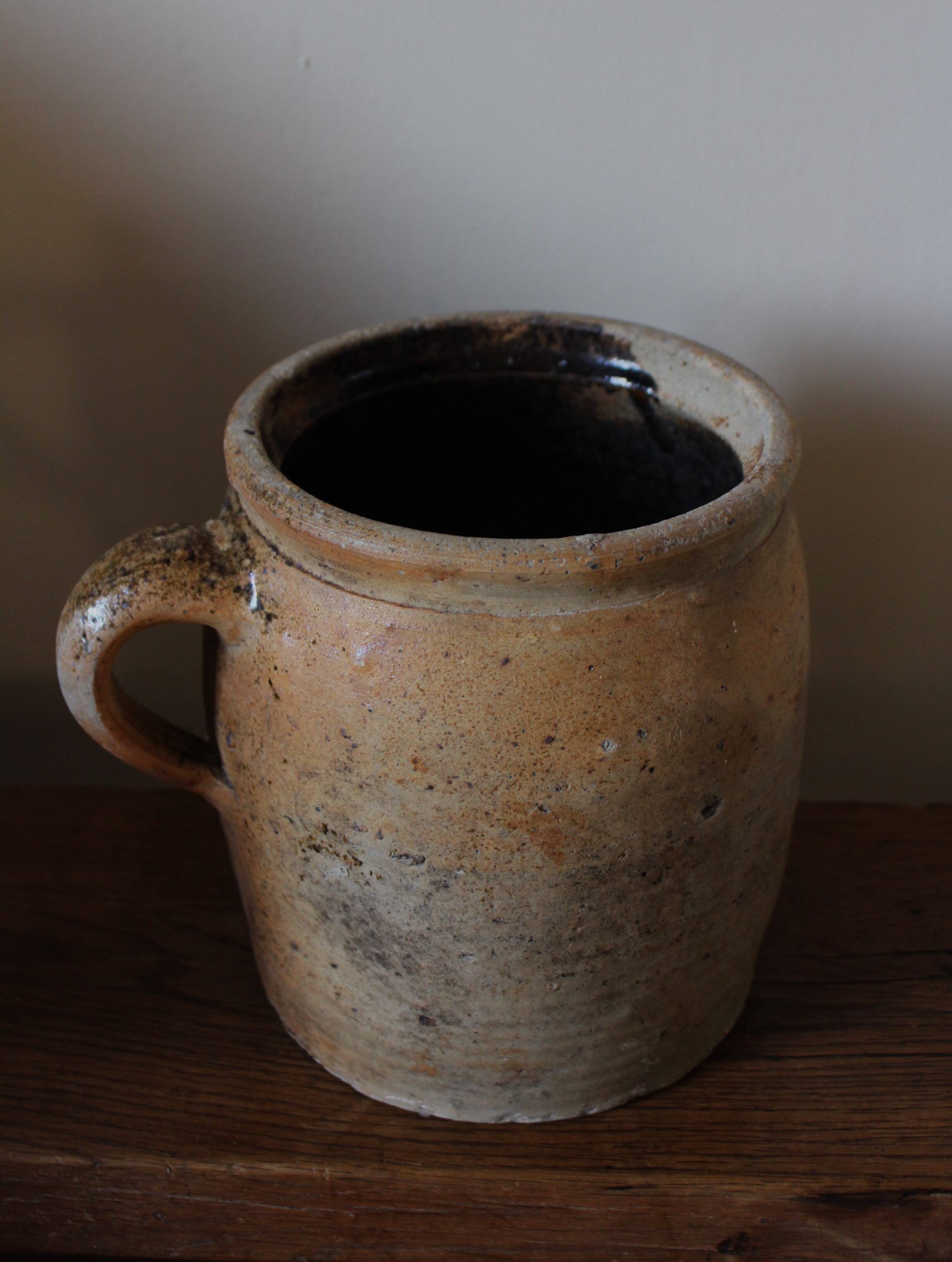 Large round terracotta pot with handle