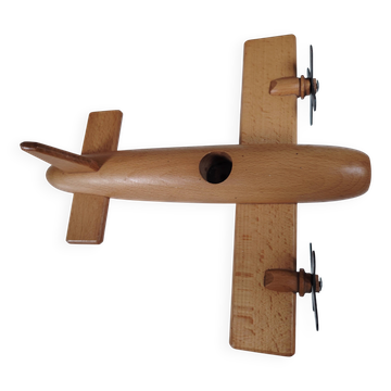 Vintage twin-engine aircraft in solid beech - Moulin Roty (1990s)