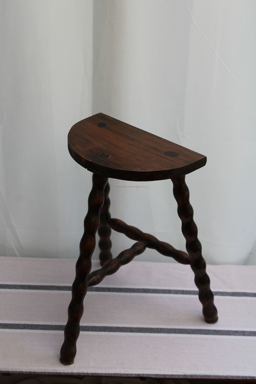 Wooden tripod stool