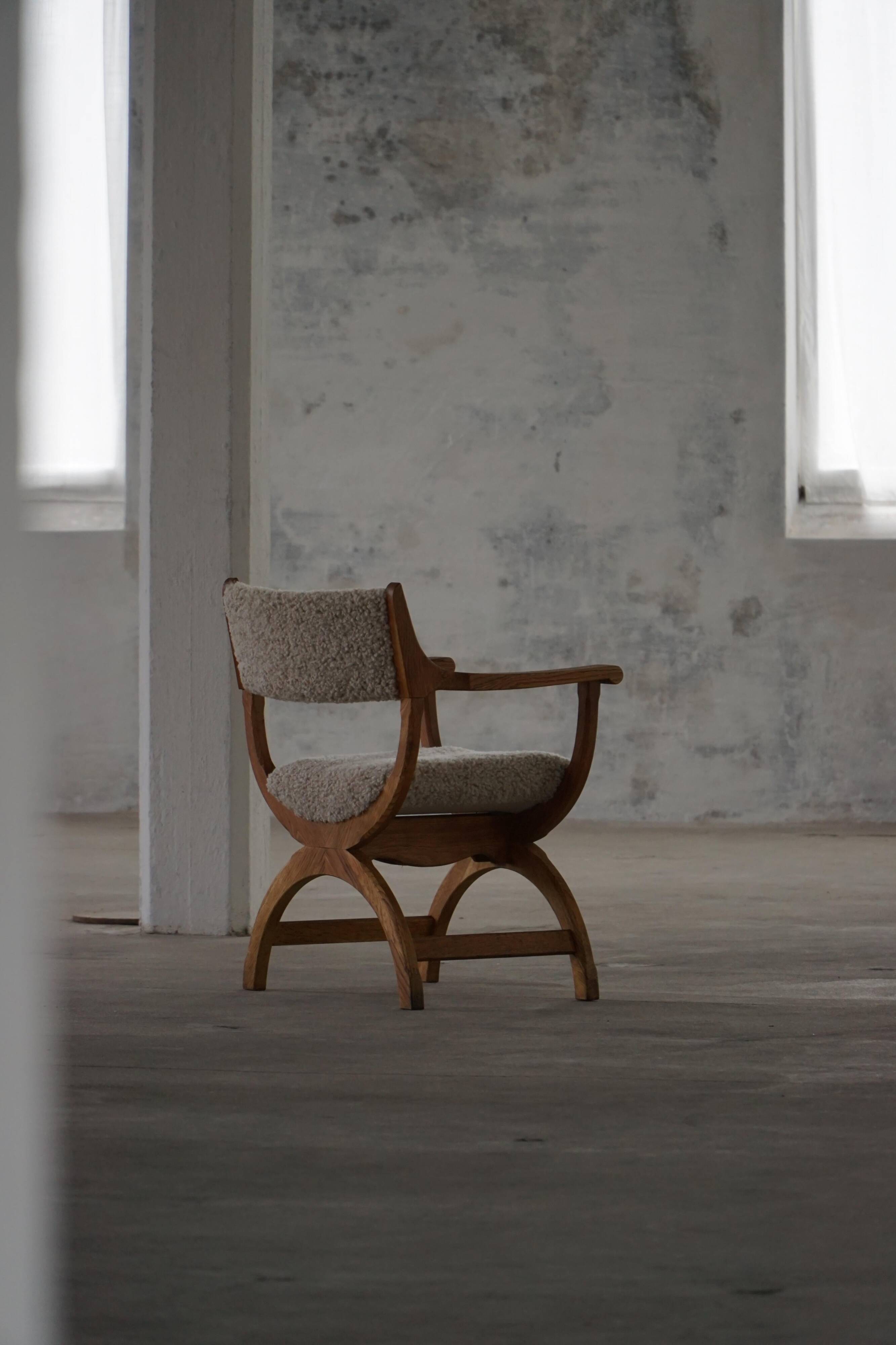 Henning Kjærnulf, Oak and lambswool armchair, "Kurul" model, Mid-century, 1960s