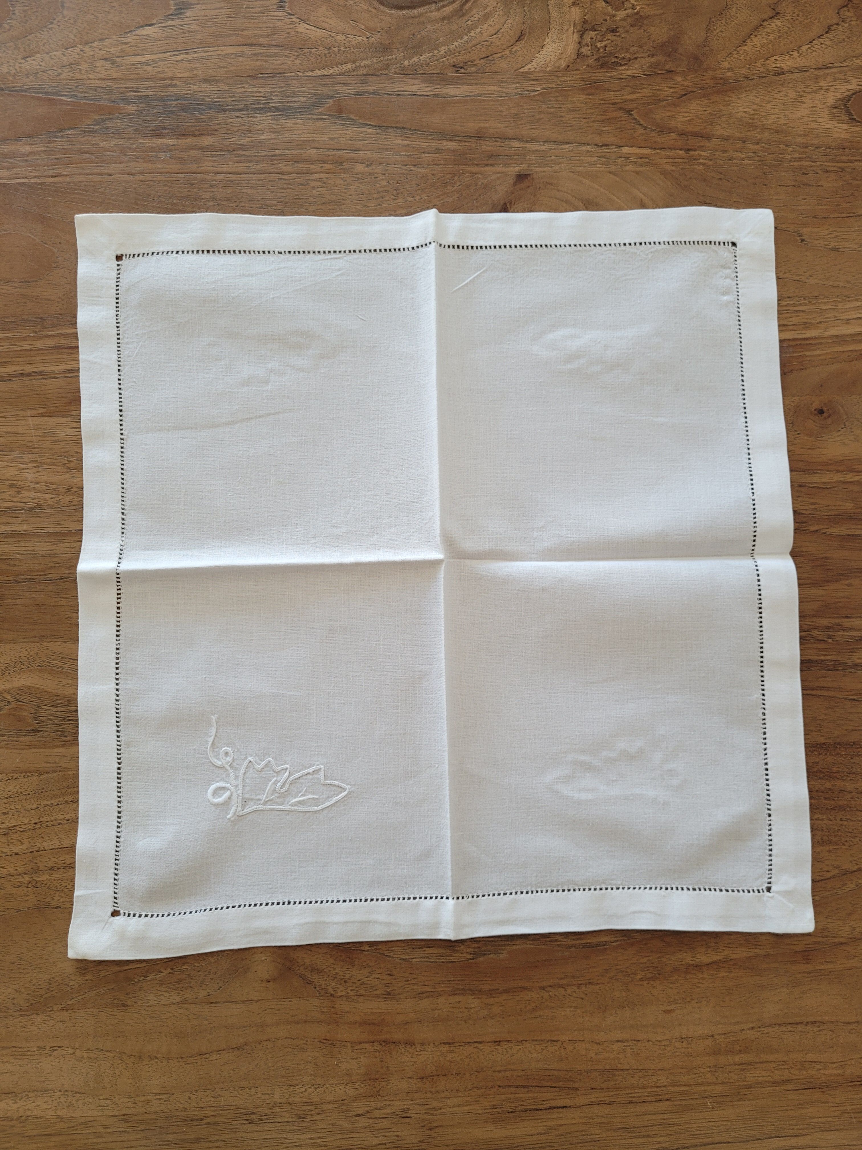 11 white embroidered towels