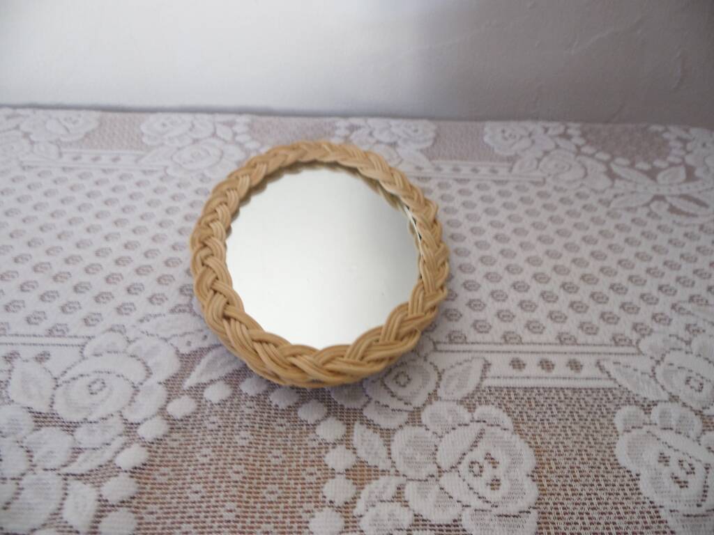 Small oval wicker mirror