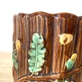 Antique slip pot with acorn decoration