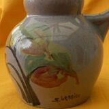Ceramic pitcher by simone larrieu.