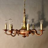 Bronze chandelier with double patina and 8 light arms.
