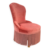 Fauteuil crapaud vintage en velours rose à franges
