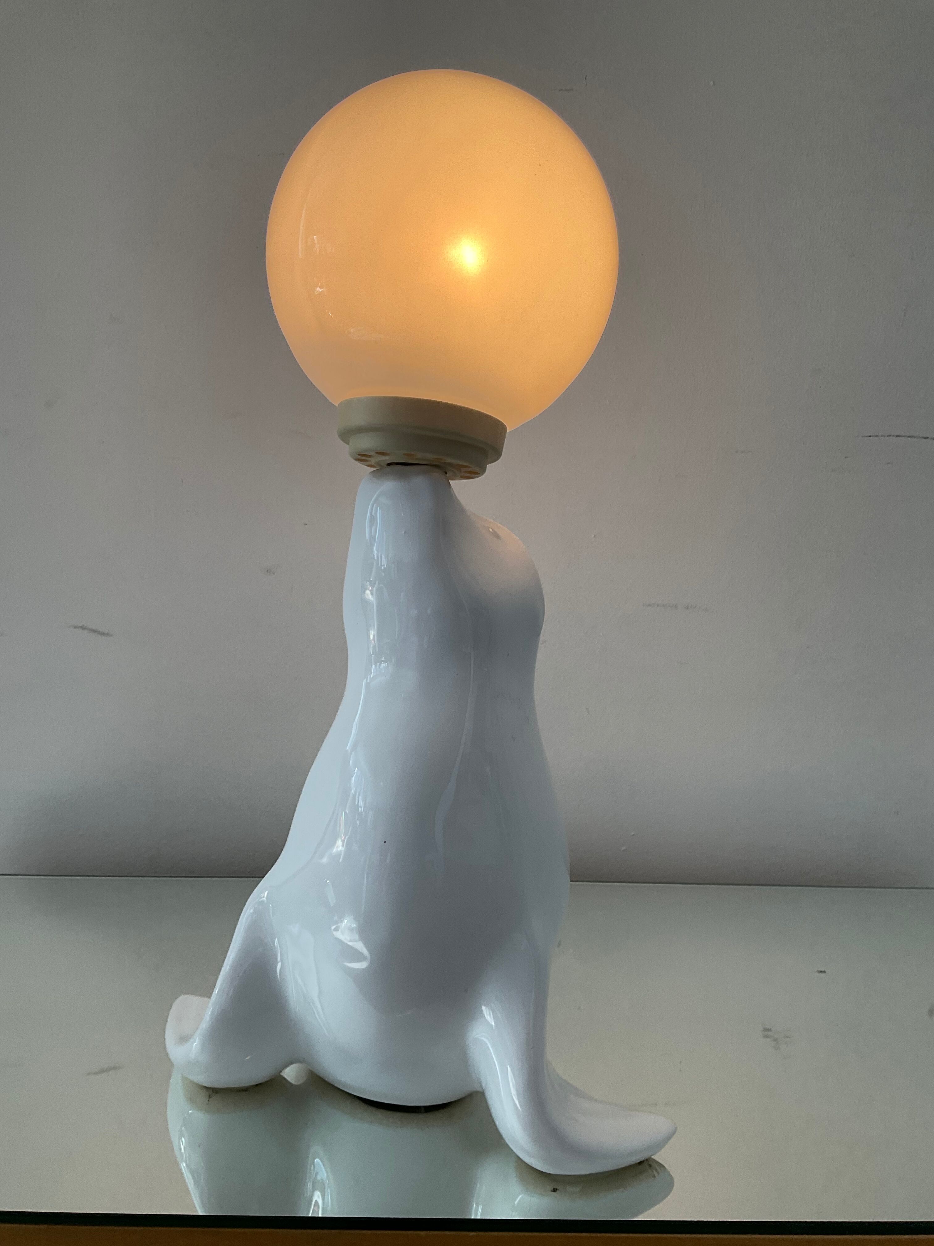 Vintage sea lion lamp in ceramic and opaline