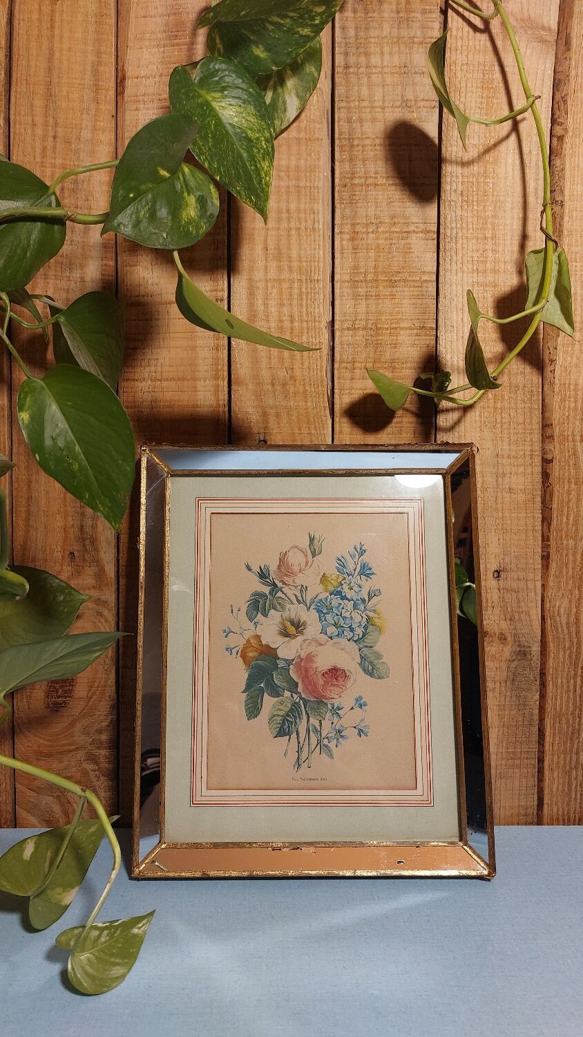 Flower print and period mirror frame