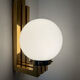 Opaline brass wall lights from the 1970s.