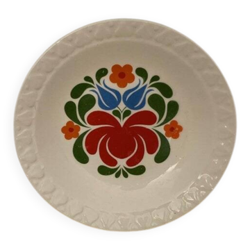Hungarian folk plate in white ceramic with hand-painted flowers, embossed edge.