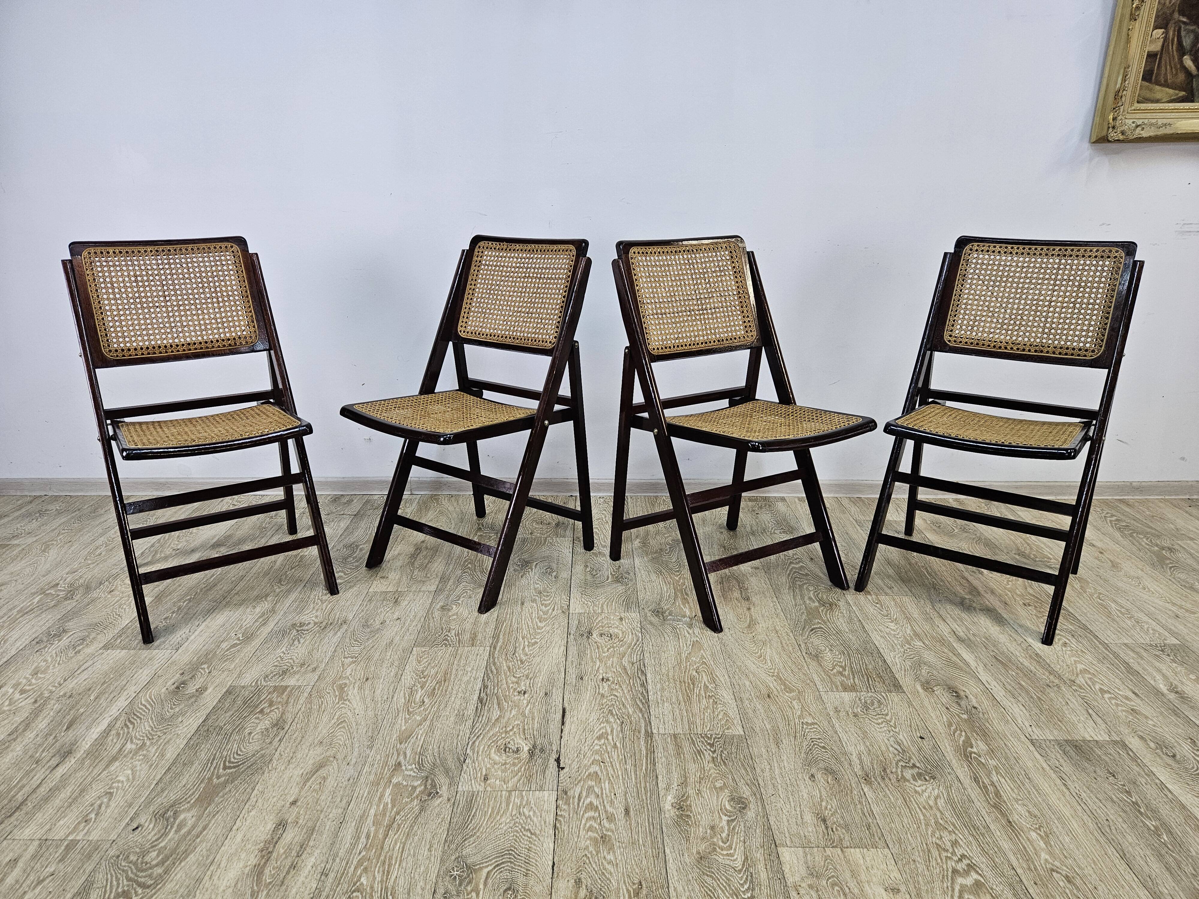 Folding wooden chairs with raffia, 1970s.