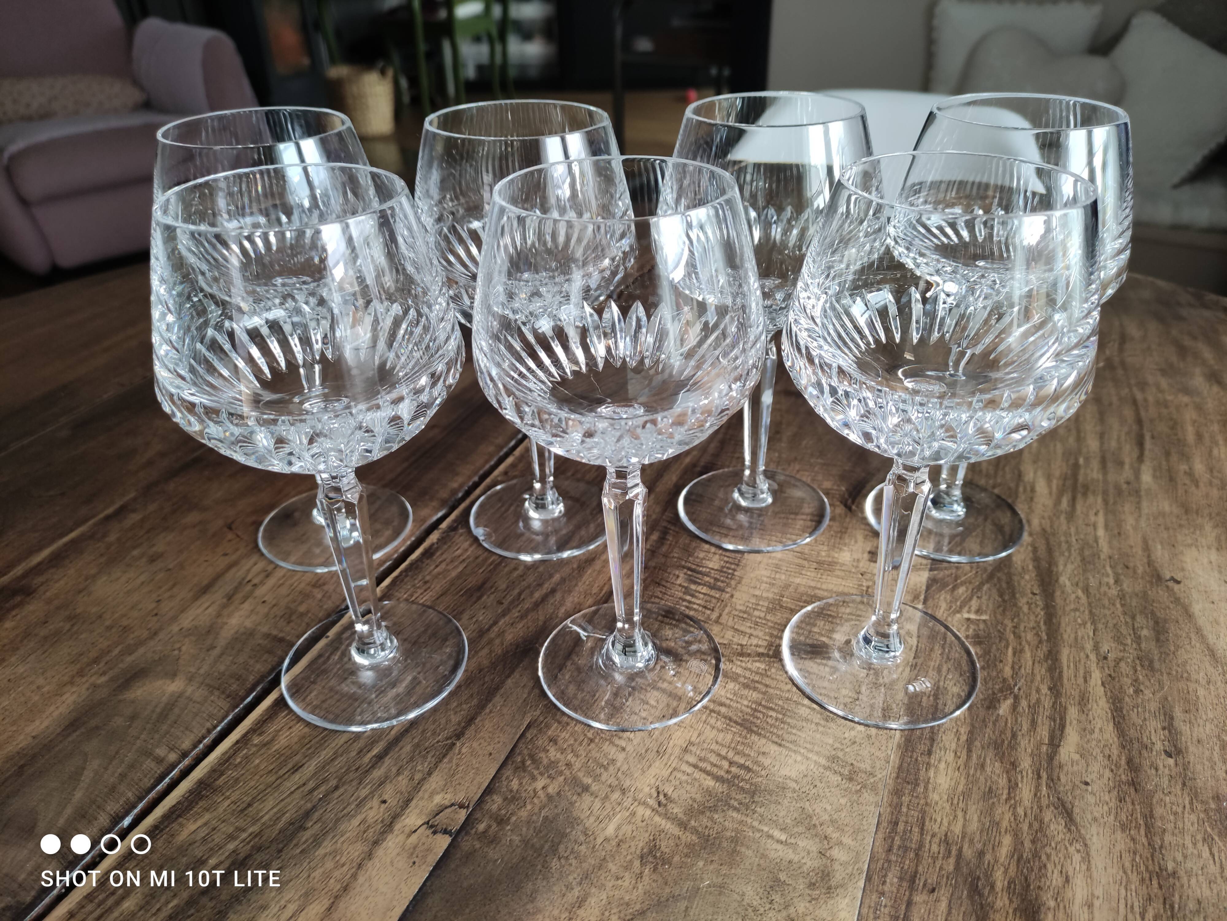 Set of 7 cut crystal wine glasses