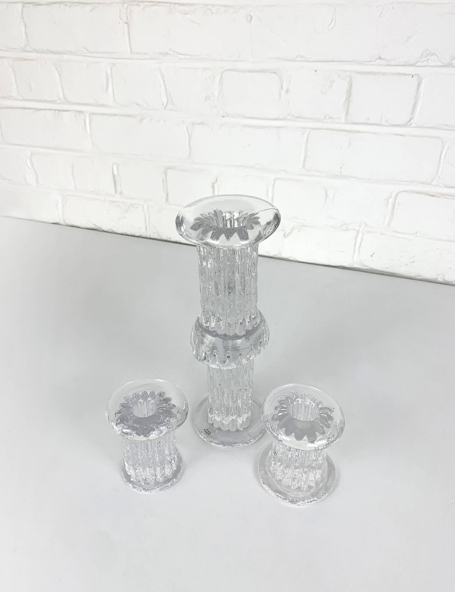 Glass candle holders by Göran Wärff for Kosta Boda, Sweden, 1970s.