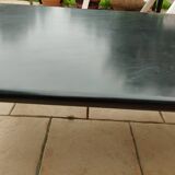 Old vintage wooden coffee table with tubular base