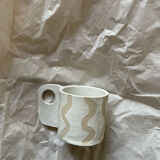 Mug type cup in white glazed stoneware wave