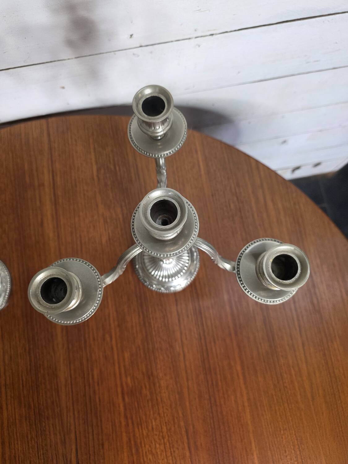 Pair of Louis XVI style candlesticks in silver-plated bronze