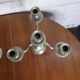Pair of Louis XVI style candlesticks in silver-plated bronze