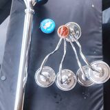 Standing candlestick in stainless steel metal with 5 movable branches, with smooth ring for 4 cm candles.