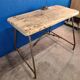 Vintage workbench circa 1930, folding metal leg.