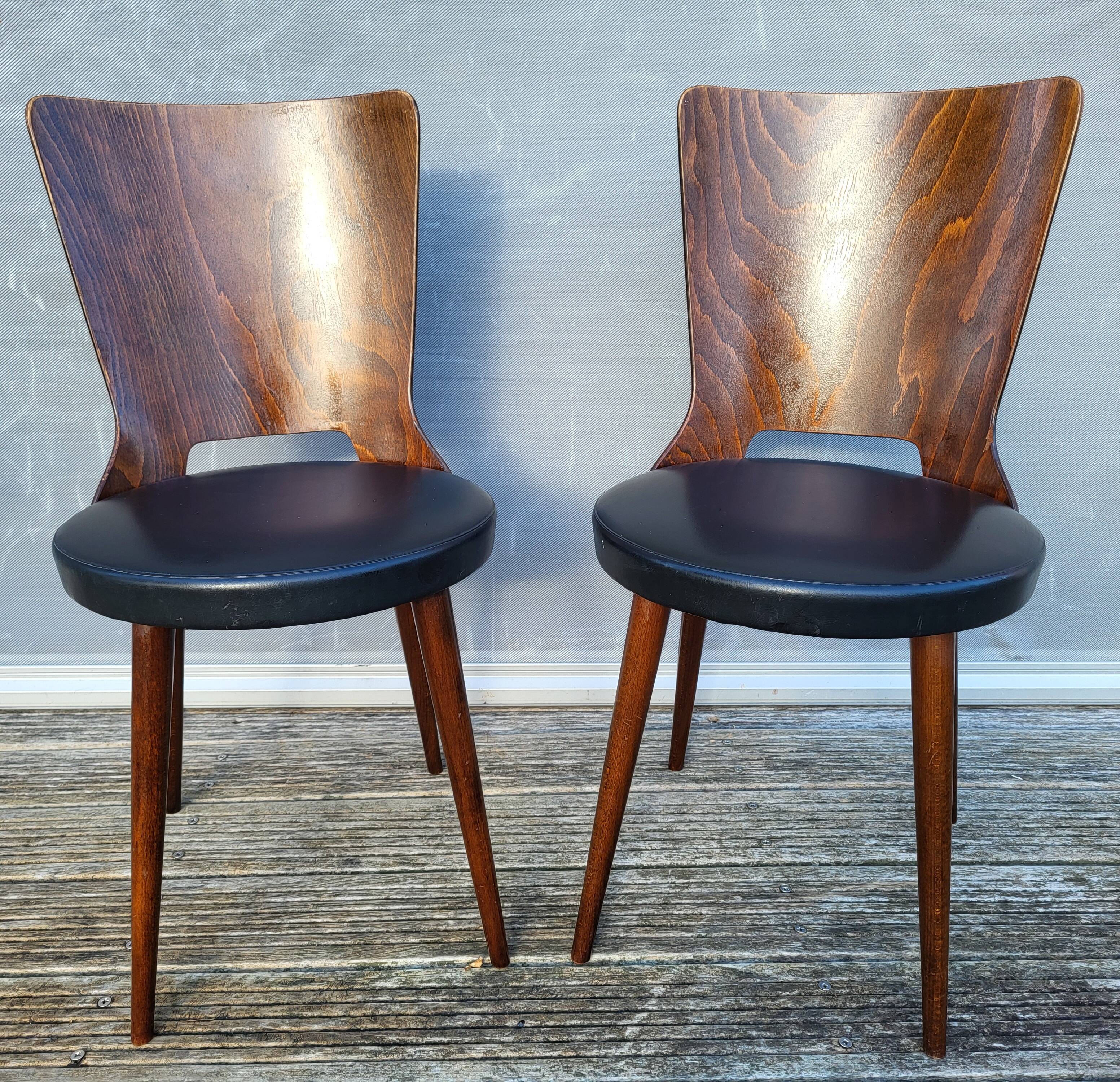 Pair of Dove chairs • Baumann • Black faux leather