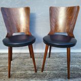 Pair of Dove chairs • Baumann • Black faux leather