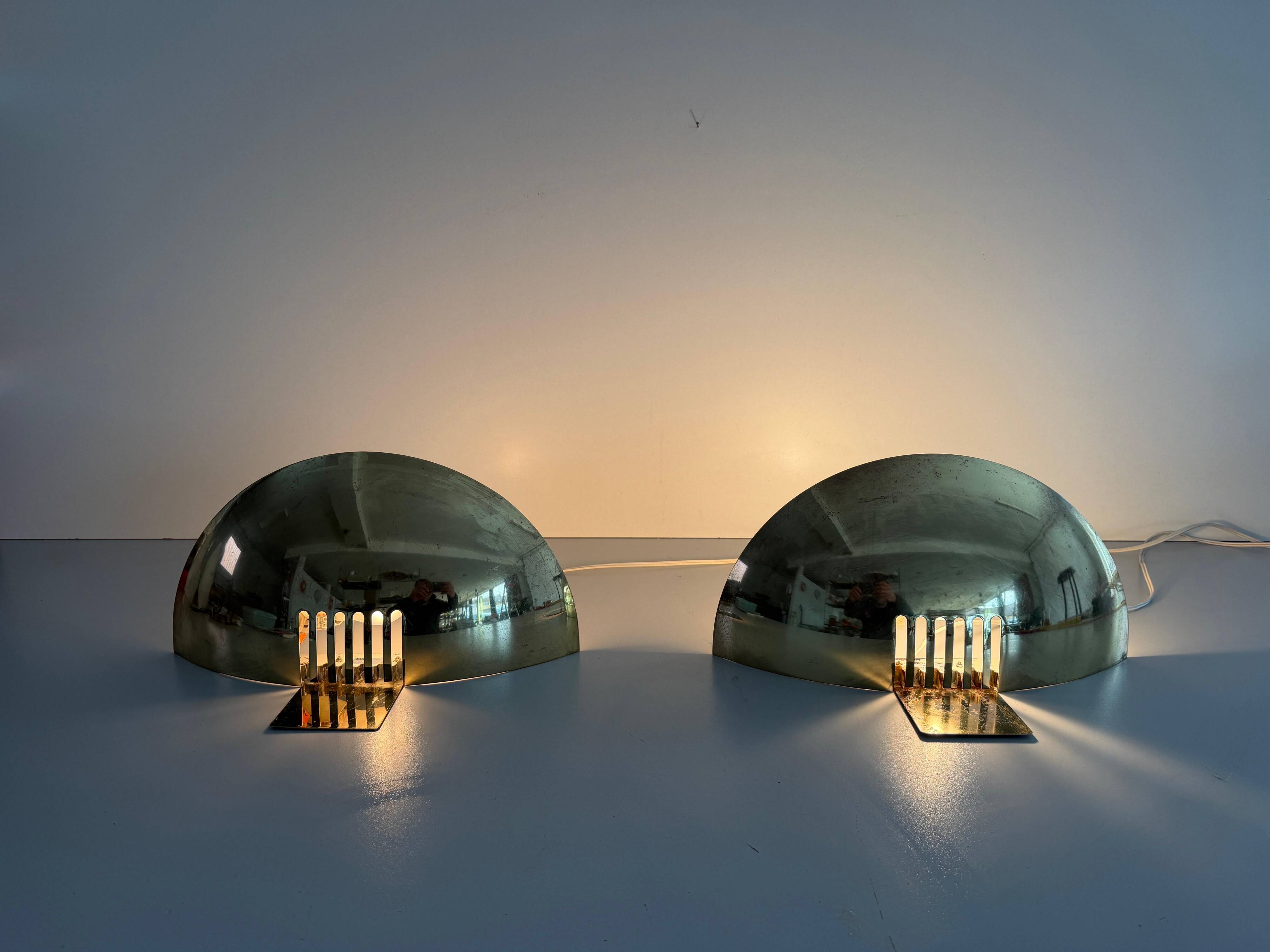 Pair of brass wall sconces from the mid-century by SCE, 1960s, France.