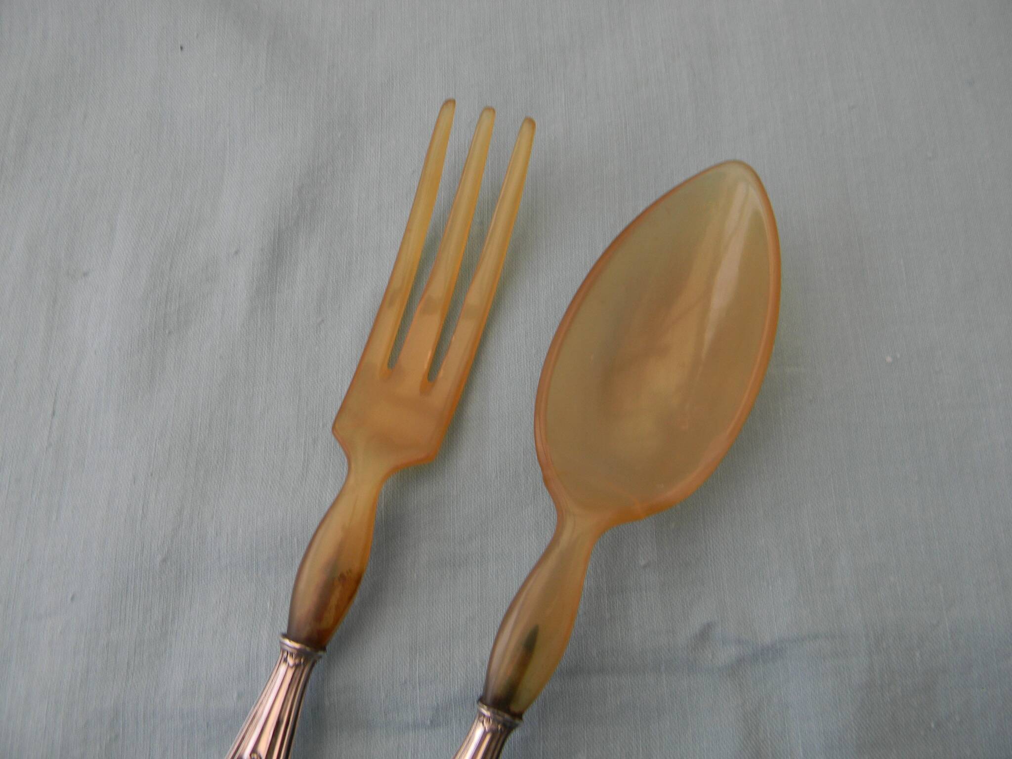 Salad cutlery with silver-filled handles. Minerva hallmark.