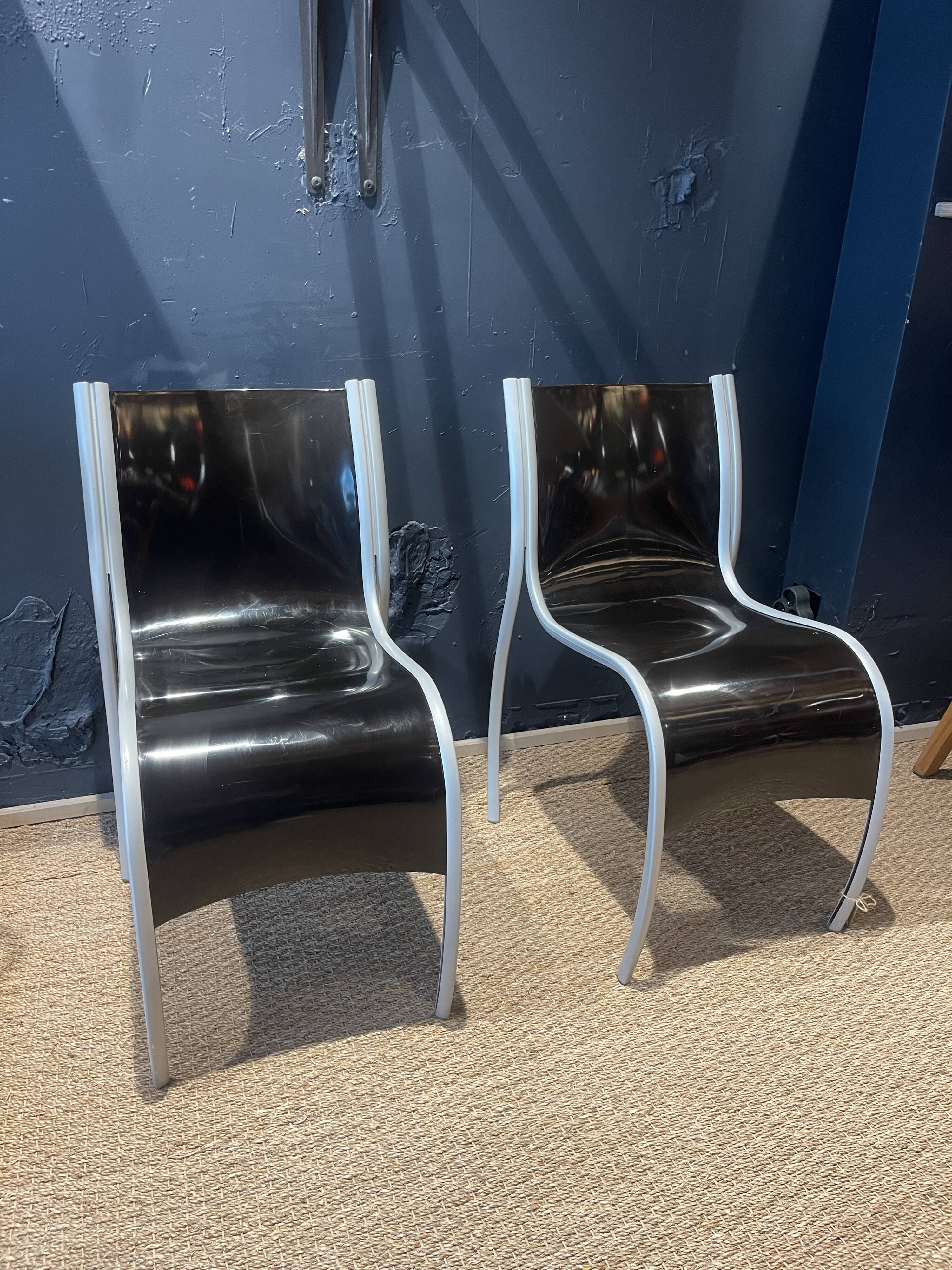 Pair of FPE chairs by Ron Arad for Kartell black Italy 2000s