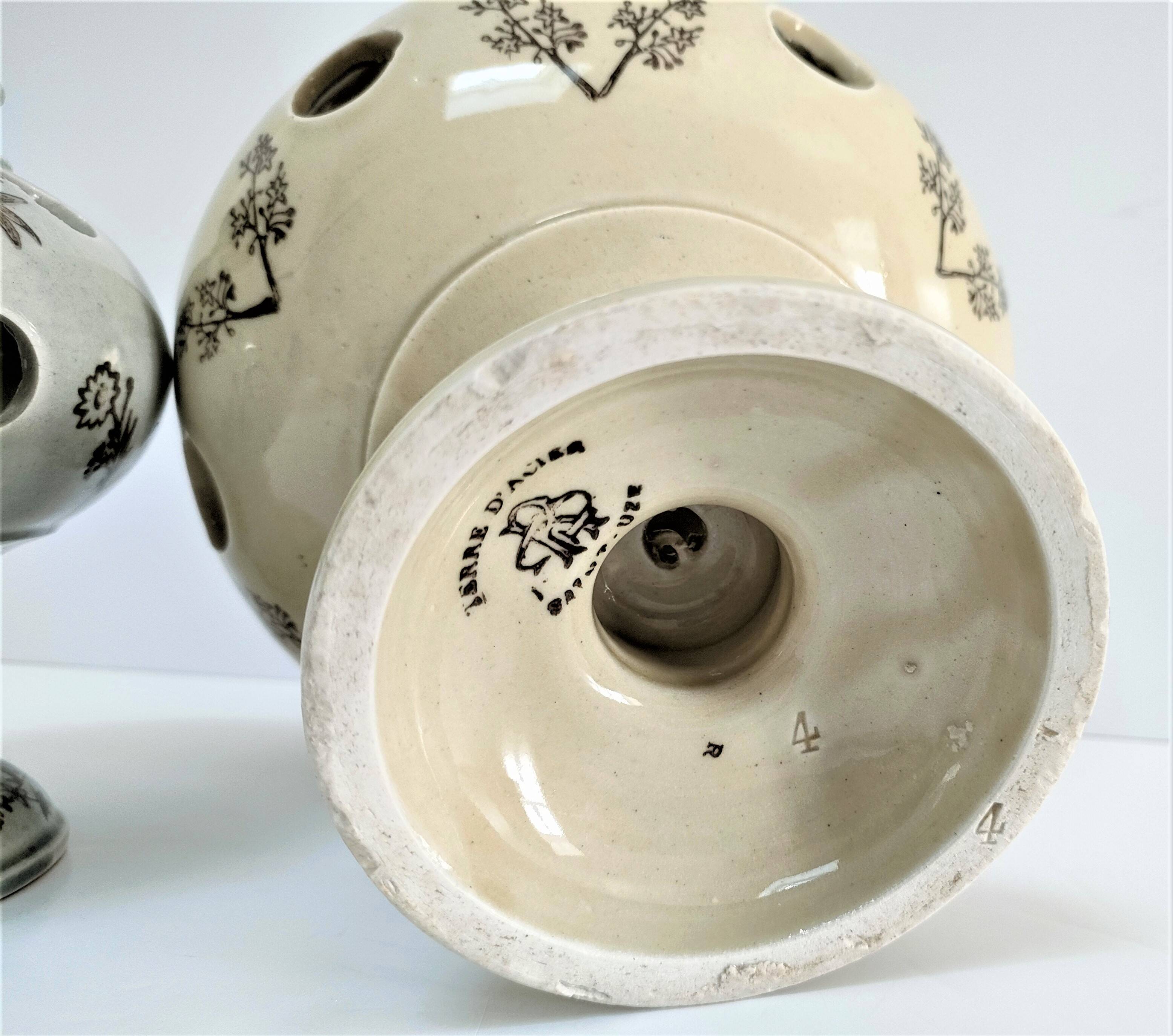 Three Saint-Uze ceramic tealight candle holders, early 20th century