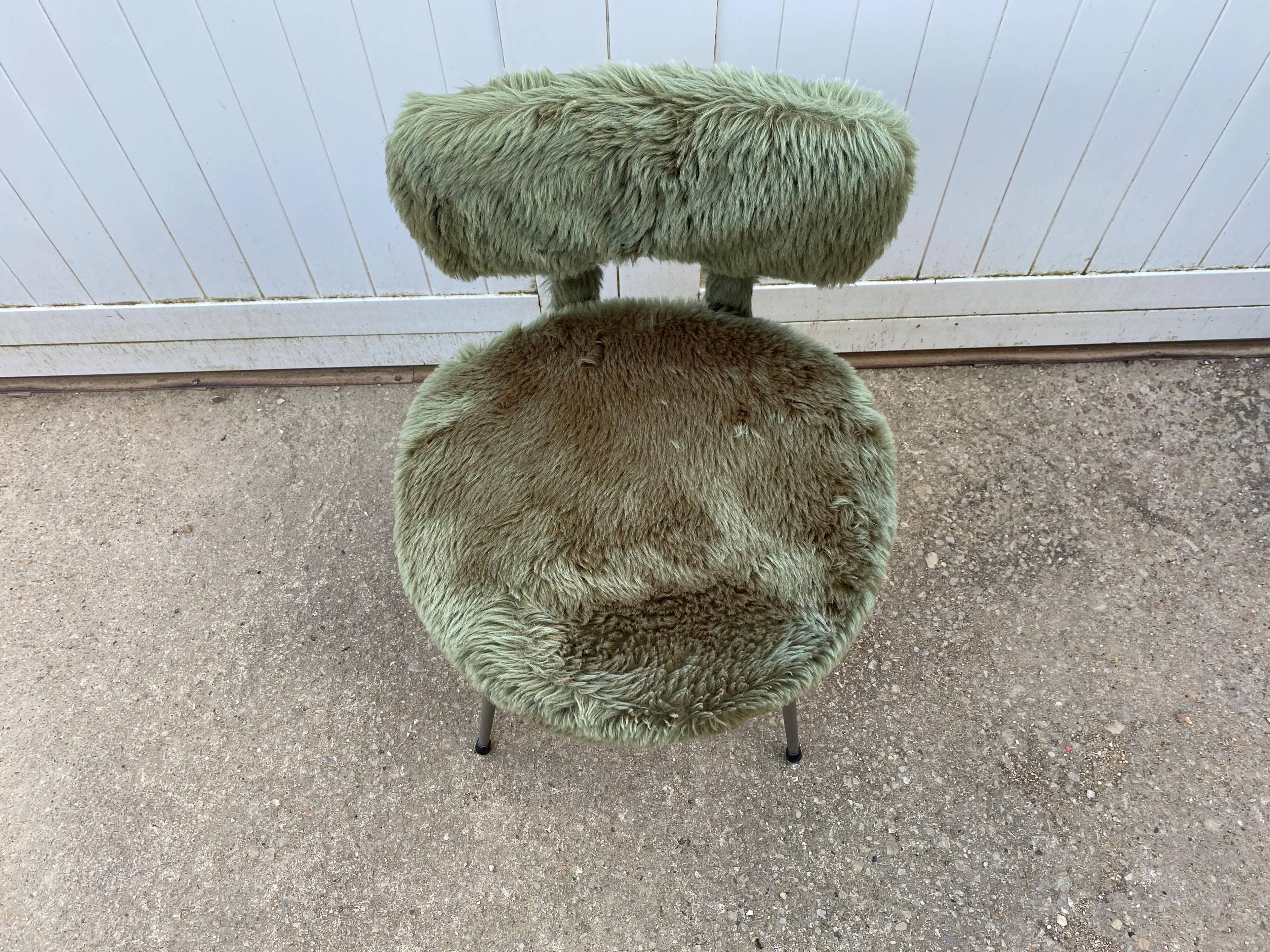 Vintage green furry chair from the 1960s