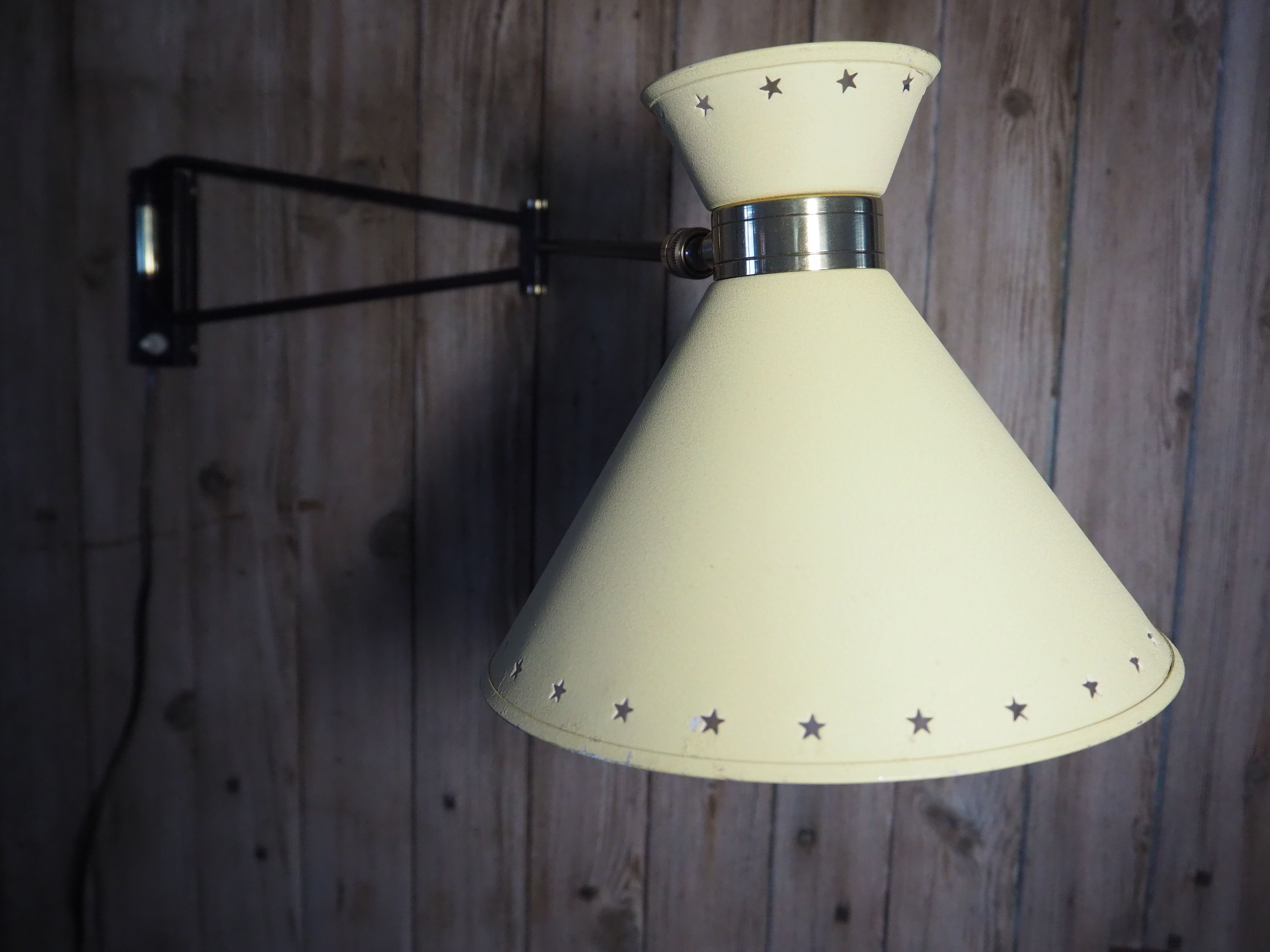 Diabolo articulated wall lamp by designer René Mathieu