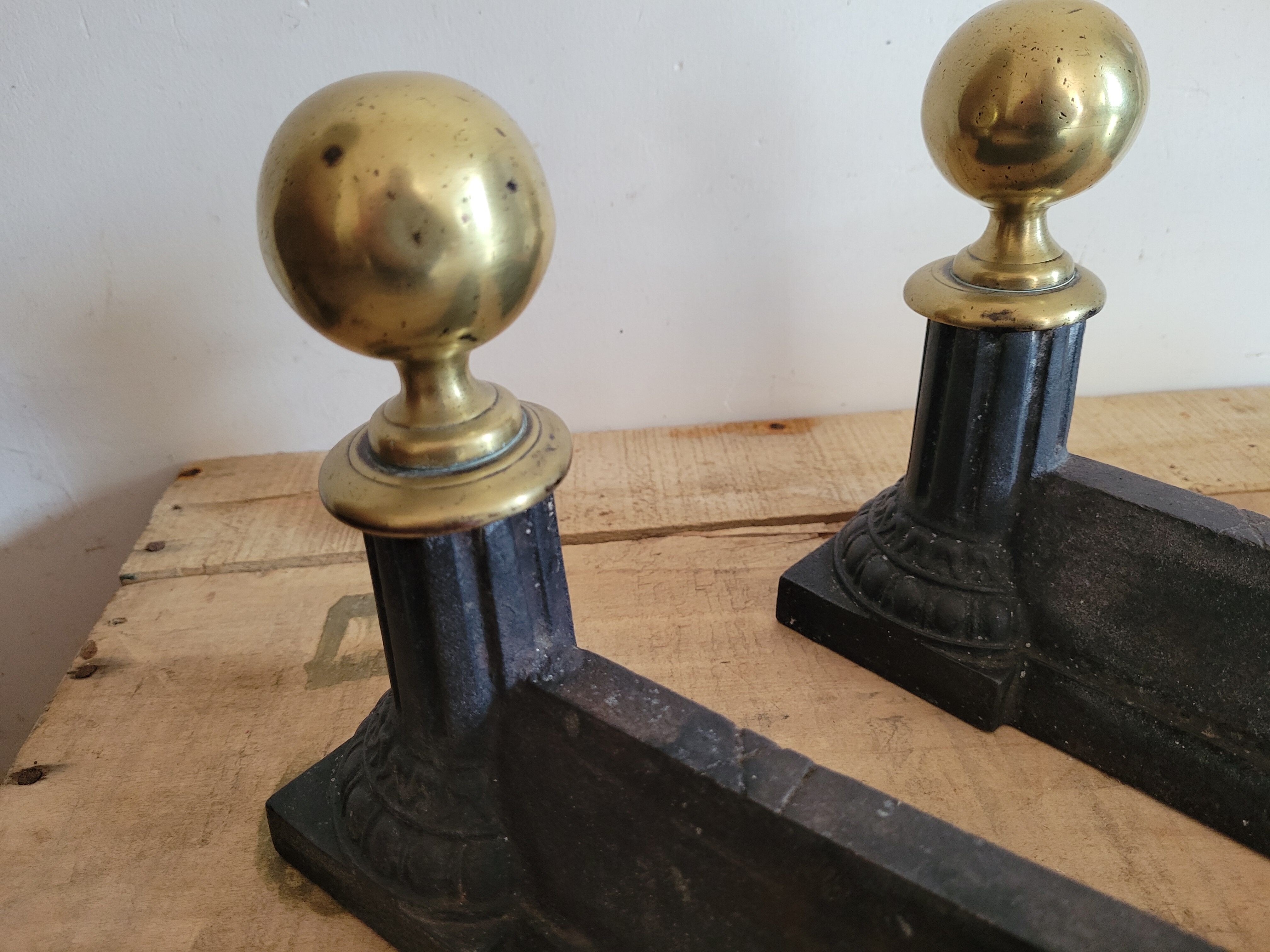 Pair of cast iron and brass chenets