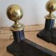 Pair of cast iron and brass chenets