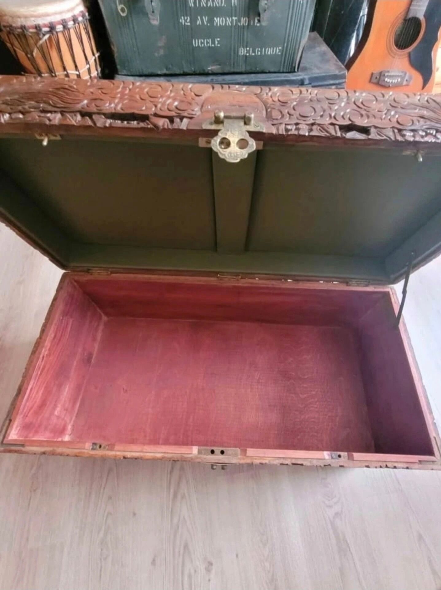 Carved chest in Asian camphor wood, chinoiserie boat decoration.