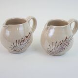Pair of ceramic milk jugs signed La Roue Vallauris
