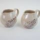 Pair of ceramic milk jugs signed La Roue Vallauris