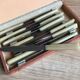 12 ivory handle knives in their case