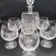Carafe et  6 verres à cognac en cristal taillé main . Années 60 .