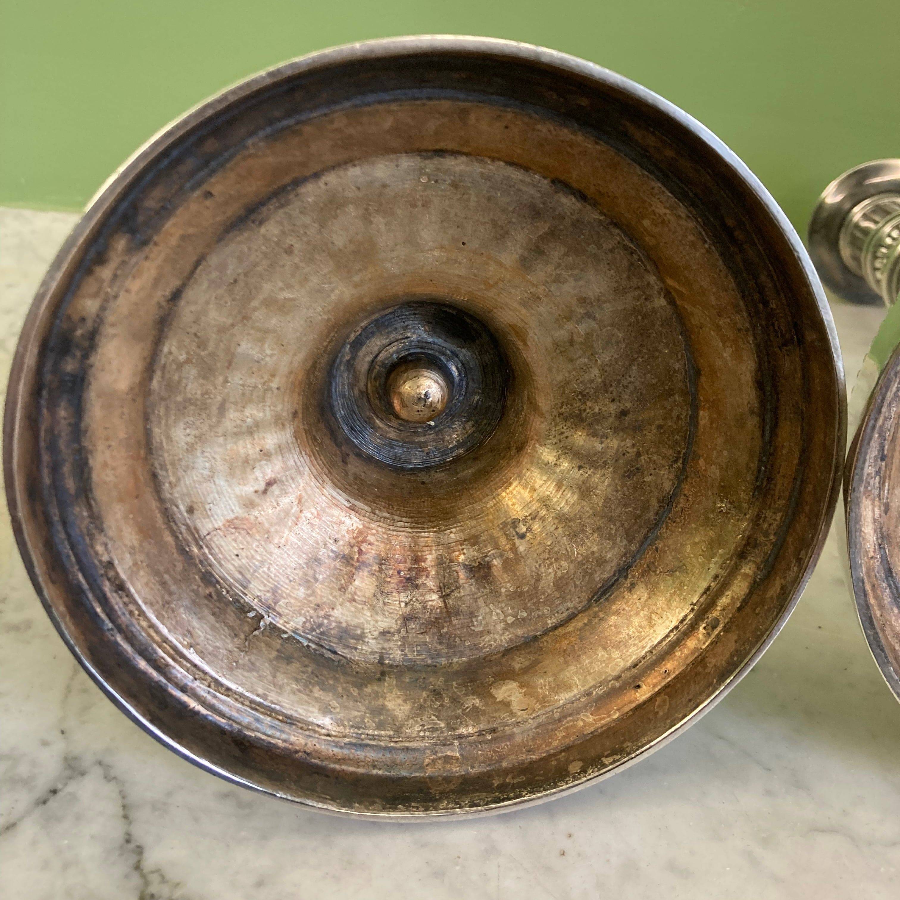 Pair of silvered bronze candlesticks from the 19th century in Louis XVI style signed Voisenet.