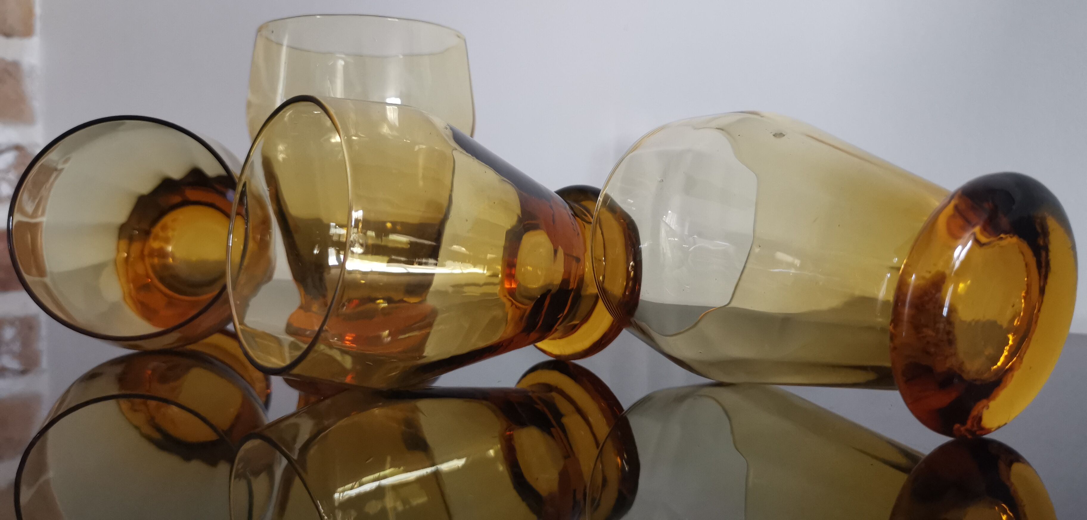 4 old amber colored glasses