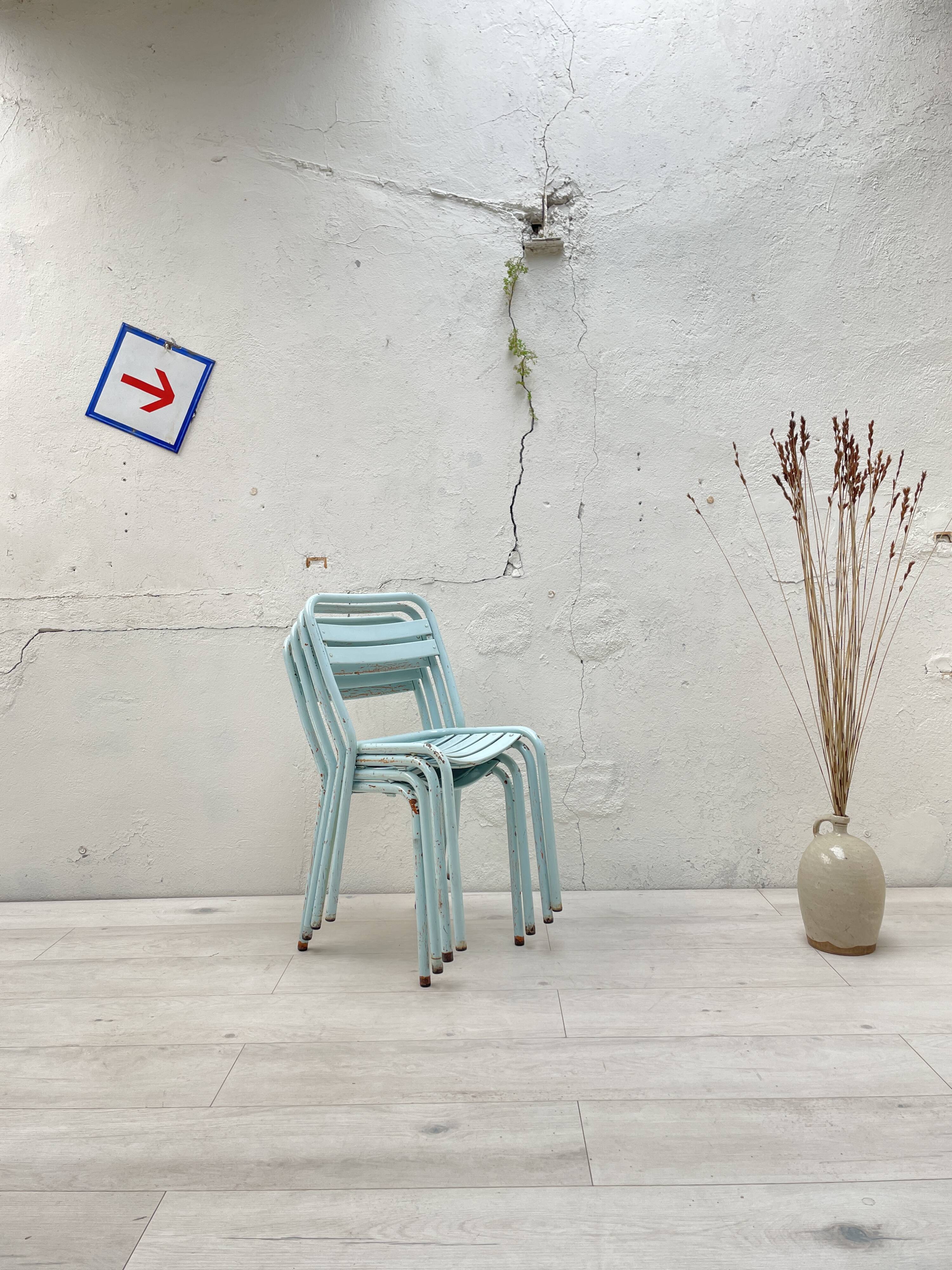 Set of four Tolix T2 chairs, circa 1950.