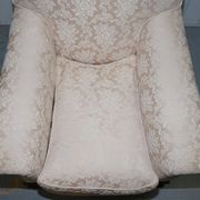 Victorian suite in damask, walnut frame, legs carved in lion's paw.