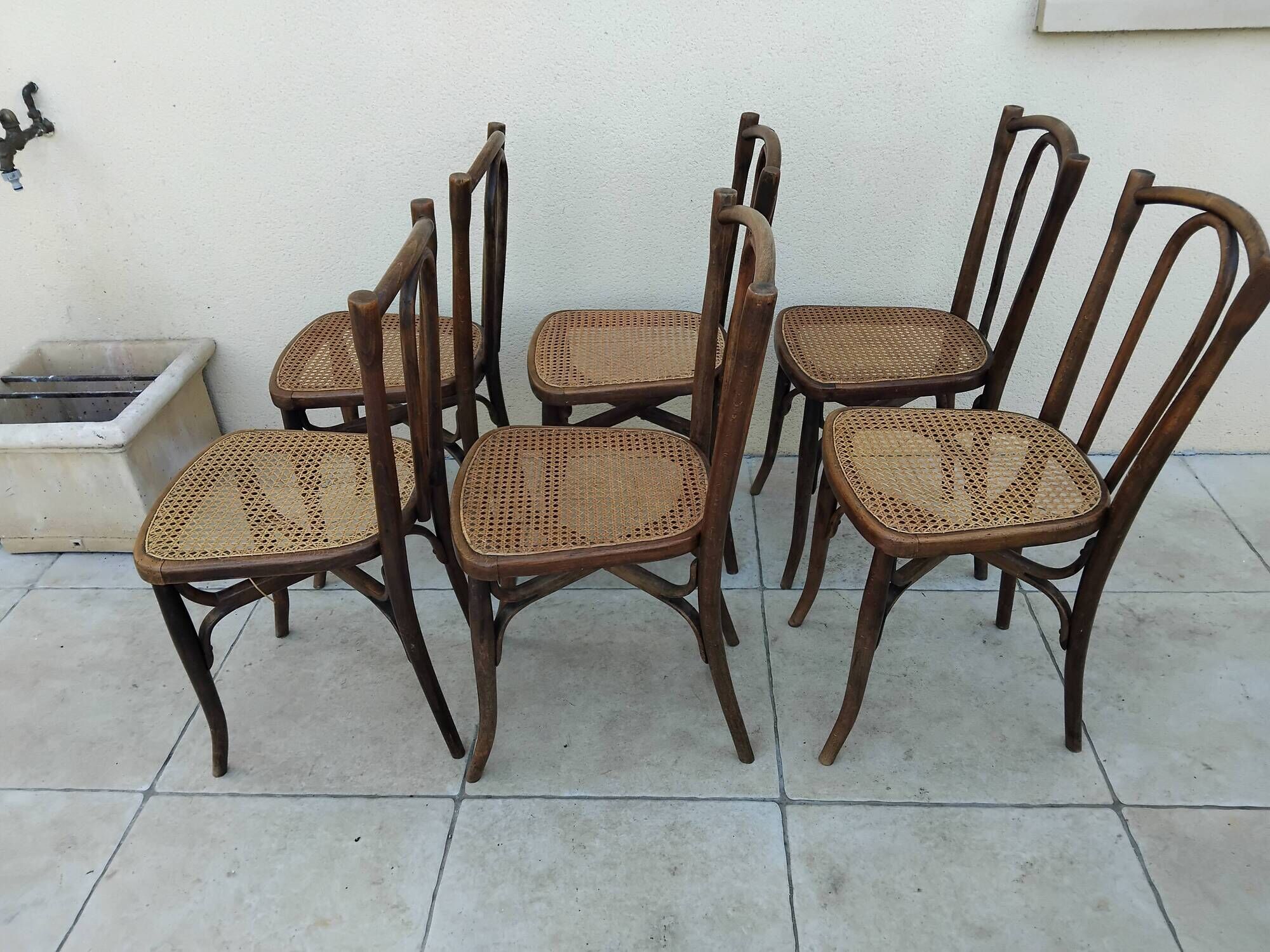 6 antique bistro chairs with curved wood and caning from 1900 L&H Cambier Frères