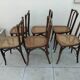6 antique bistro chairs with curved wood and caning from 1900 L&H Cambier Frères