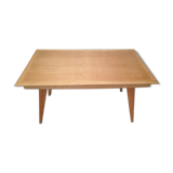 Dining table with compass feet