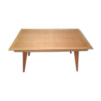 Dining table with compass feet